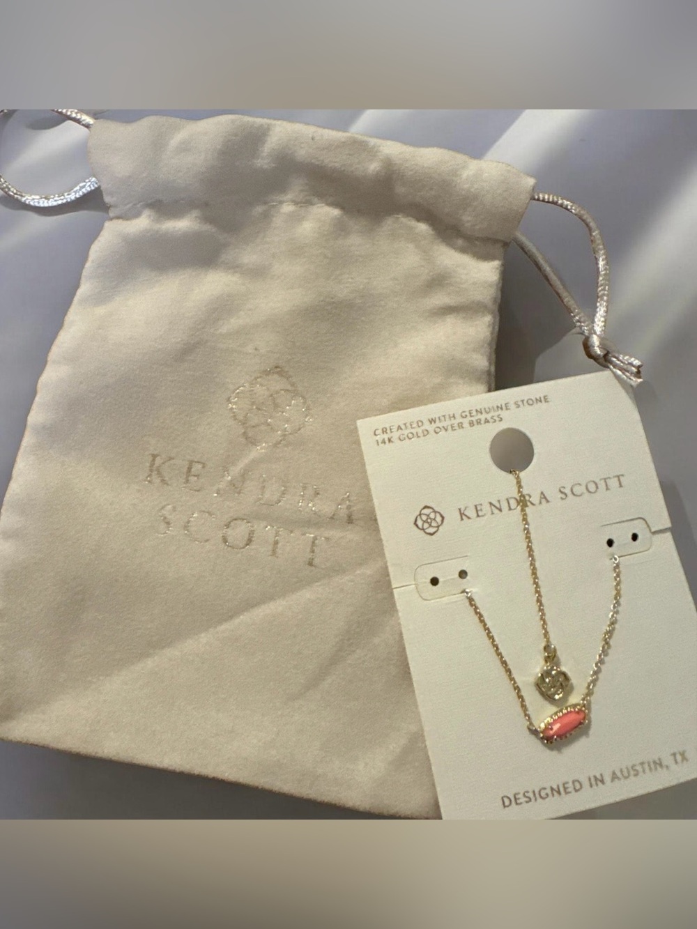 Kendra Scott Gold Necklace with Coral Pink Oval Pendant